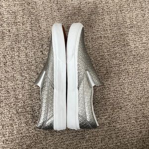 Too big in toe box. Worn once.